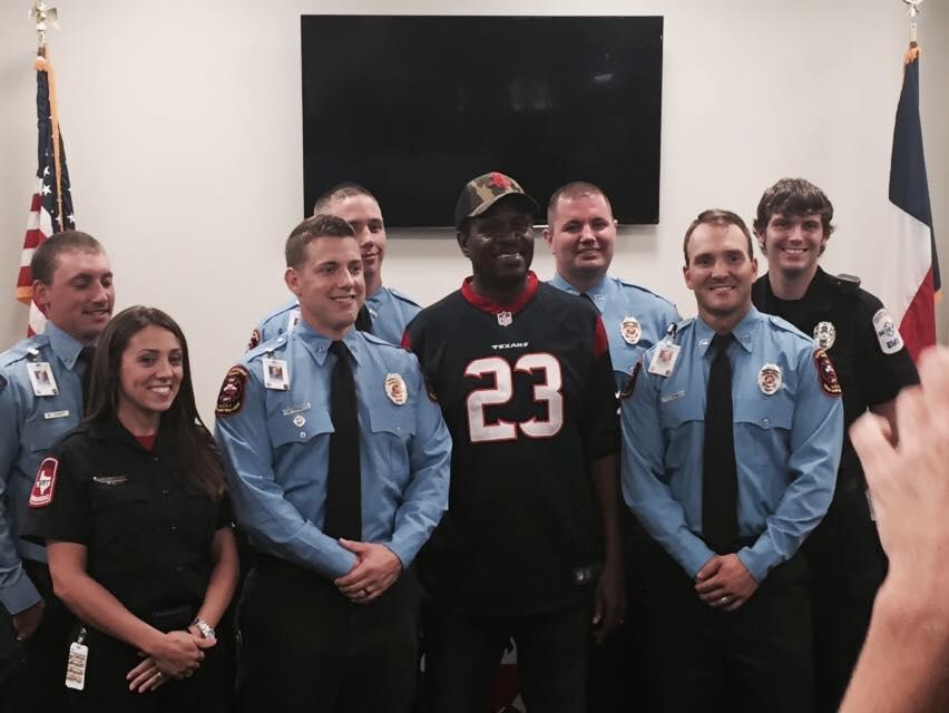 Photo of South Montgomery County Fire Department members and a civilian standing in the board room.
