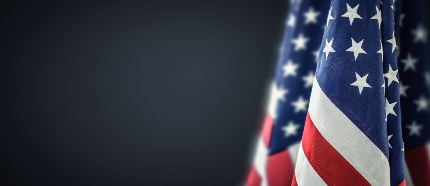 Close-up of an American flag with visible stars and stripes, symbolizing patriotism, and representing the SMCFD Veterans.