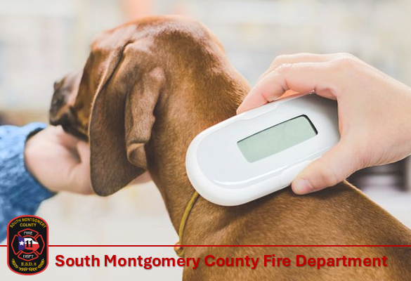 A person scans a brown dogs neck with a microchip reader. The South Montgomery County Fire Department logo and name are displayed at the bottom of the image.