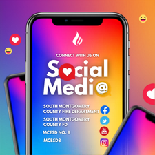 A smartphone screen displays a colorful gradient with text promoting the South Montgomery County Fire Department on social media, including Facebook, Twitter, and Instagram icons. Hearts and smiley face emojis float around the image.